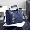WolFum Women's Fashion Handbag, Small PU Leather Structured Shoulder Bag with Metal Crystal Tassel, Black – Double Comfort view 3