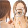 Compact Round Cosmetic Mirror with 10x/20x Magnification, Suction Cup and Tweezers view 2
