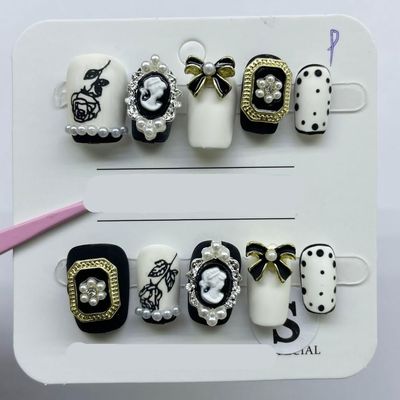 Handcrafted Black and White Press-On Nails with Bow, Reusable and Removable, Size M