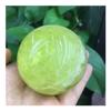 JRXFXEKW Natural Quartz Crystal Sphere with Citrine Stones view 3