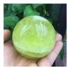 JRXFXEKW Natural Quartz Crystal Sphere with Citrine Stones view 4