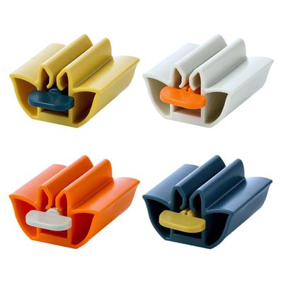 STOBAZA 4-Pack Lotus-Shaped ABS Toothpaste Tube Squeezers, Portable, for Toothpaste and Ketchup Tubes, Assorted Colors