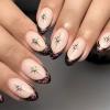 24 Short Almond Press-On Nails with Glitter Stars and French Tips view 4