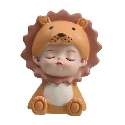 Yellow Resin Cake Ornament with Child Design