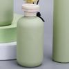 DECORNIJIA 4-Pack Empty Refillable Shampoo and Lotion Pump Bottles with Lids view 2