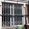 White Folding Window Security Grille, W130 cm view 1