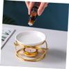 SOLUSTRE Ceramic and Iron Aroma Diffuser, Gold Oil Diffuser with Night Light for Bedroom or Desk Decor view 4