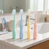 Tressify 4-Piece Adult Toothbrush Set with Soft Bristles, Wide Heads, Family Pack in Green, Orange, Yellow, and Blue view 2
