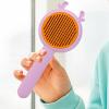 2-in-1 Dog Grooming Brush, Massage and Cleaning Comb view 4