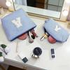 Personalized Blue Makeup Bag with Butterfly Fringe Initial Keychain for Women and Girls view 3