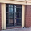 Adjustable Sliding Safety Bar with Lock for Windows and Gates view 1