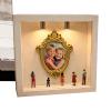DIY Silhouette Display Box with Golden Miniature Frames and Figurines view 1