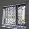 White Foldable Aluminum Window Security Bars for Burglary Protection and Fall Prevention view 1